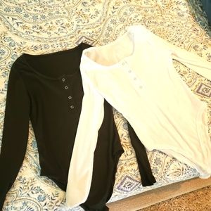 Two black and white bodysuit's